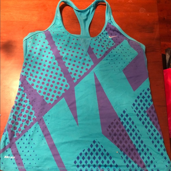 TWO EXERCISE TOPS. - Picture 1 of 4